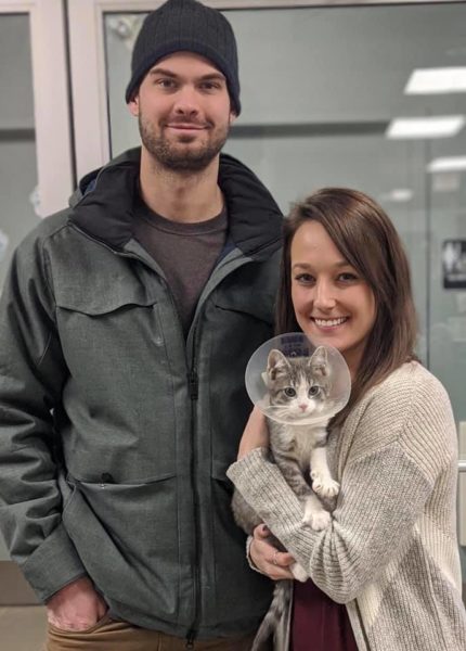 cat adoption, couple with cat