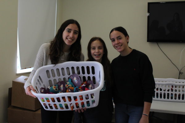 sisters, petsmart charities donation, volunteers