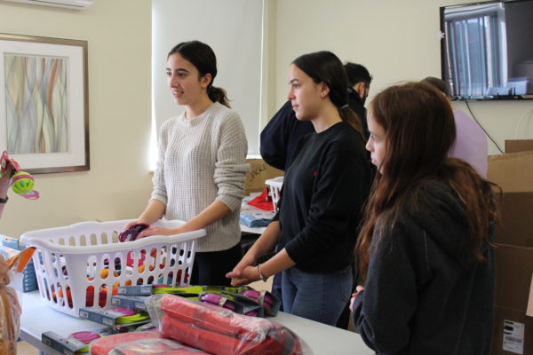 sisters, petsmart charities donation, volunteers