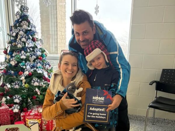 family with adopted cat