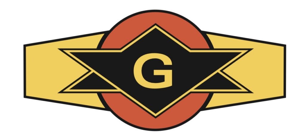 A retro-style geometric logo featuring a bold, yellow letter "G" in the center of a black multi-pointed star shape. This shape is superimposed over a red circle, flanked by a yellow banner outline on a white background.