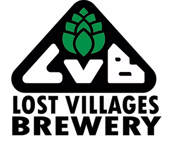 Logo for Lost Villages Brewery featuring a black rounded triangle containing the stylized white letters "LVB" beneath a green hops cone icon. Below the triangle, the words "LOST VILLAGES BREWERY" are written in bold, black block letters.