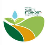 Logo for the Township of North Stormont featuring a circular graphic that resembles rolling green and gold hills under a bright blue water droplet. To the right, the text reads "TOWNSHIP OF NORTH STORMONT" with the tagline "It's a good place to grow" beneath it.